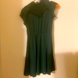 This forest green knee length dress is supper cute.